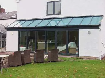 GRAND DESIGN CONSTRUCTION : Installtion of Marine Finish PP Coated 4000 series Aluminium Bi fold doors double glazed ; K2 Foiled and bespoke sprayed . self clean glass. Aluminium roof lantern wirral with a centor c1 Aluminium bi folding doors wirral Our Aluminium Bi fold range is polyester powder coated. They can come with either 28 mm argon filed double glazing or 44mm argon filed triple glazing. Our range of Aluminium Bi-fold doors are Centor C1, Schuco, allstyle, Upvc, and wood Bifolds. Our Aluminium Bifolds can be found on the Wirral in areas such a Caldy CH48, Aluminium Bifold doors can also be found in West Kirby CH48. Due to an explosion in property in Liverpool there are many more aluminium Bifold doors being installed in areas such as Formby, Crosby and Southport. Our aluminium Bi-fold doors can also be found in Alderly Edge, Aluminium Bifold doors can be found in Nutsford and Tarpoley. Our Aluminium Bifold doors can also be found in Prestbury, near Wilmslow. 